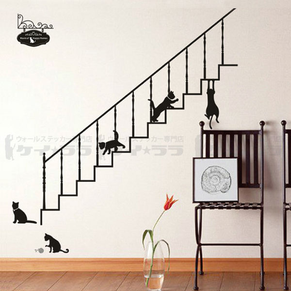 階段で遊ぶ黒猫のウォールステッカー